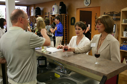 WISE Attendees enjoying a wine sample.