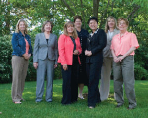 Photo by: Kelly Loucks Wilson; KriZma Photography 2008-2009 AWE BOARD OF DIRECTORS: Front row from left: President Kim Schamberger of Finishing Touches by Kin, Vice President Beverly Mapes of Top of the List, Marketing Chair Connie Sweet, Connection Group, Programs Chair Floriza Genautis, Management Business Solutions, Treasurer Kathy Heintzelman, Heintzelman Accounting Services, Inc. Back row from left: Membership Chair Suzanne Knight, 1-2-1 Personal Computer Training and Secretary Deanna Fridley, Crosby and Henry Insurance 
